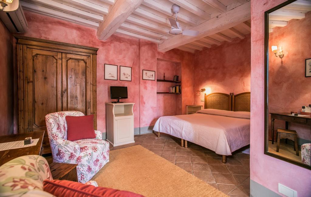رادا إنْ كيانتي La Locanda Volpaia الغرفة الصورة